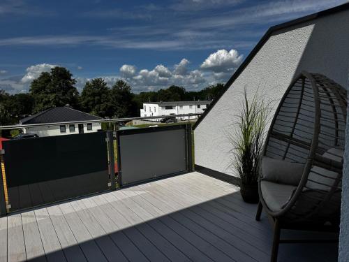 FeWo Singapore 3-Zimmer Wohnung mit Balkon am See in Gross Koris