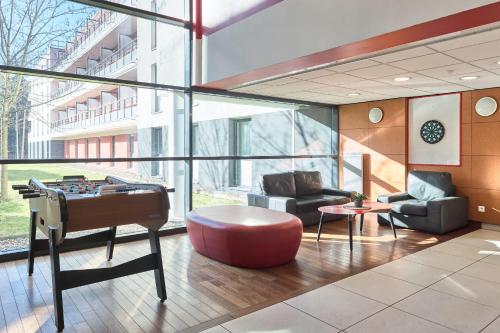 Фойє, Comfort Aparthotel Versailles, St Cyr l'Ecole in Сан-Сир-ль'Еколь