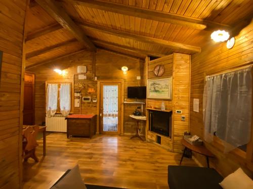 Casa vacanza Chalet Baita nel Bosco gîte à louer Poggio