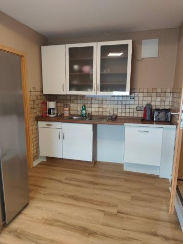köök, Gästehaus Atrico HS 67, WG 1 (Gastehaus Atrico HS 67, WG 1) in Surwold