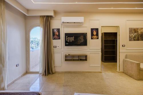 Chambre triple, vue sur la ville, 3 lits
