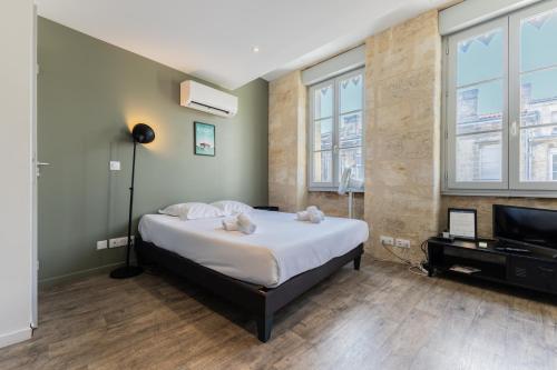 Bel appartement lumineux avec climatisation et pierre Bordelaise pour 2p