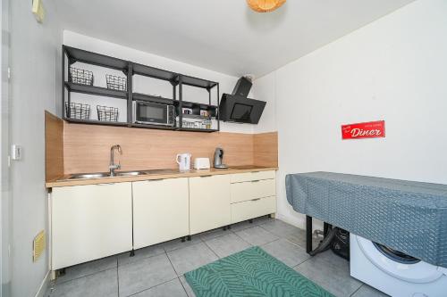 Cozinha, Le Nid du Loing - Appartement Climatisé (Le Nid du Loing - Appartement Climatise) in Chateau-Landon