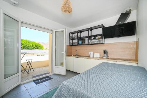 Cozinha, Le Nid du Loing - Appartement Climatisé (Le Nid du Loing - Appartement Climatise) in Chateau-Landon