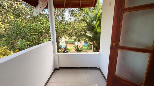 Blissful Chateau Garden View Upper Floor 2BR Homestay Near Dickwella Beach - image 2
