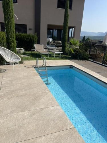 Luxury Apartment with Private Garden & Vineyard Views in Kaltern