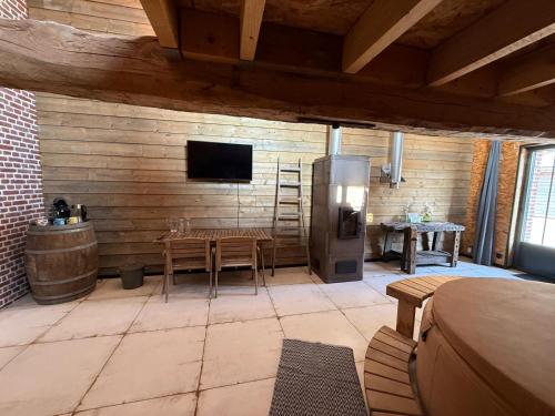 Odyssée - Chambre d'hôtes avec sauna privatifs, spa et filet suspendu 4