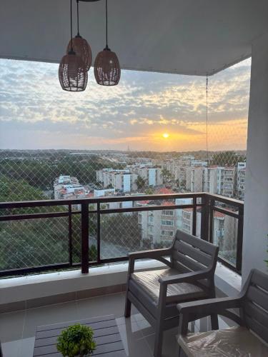 Balcony/terrace, Tu escapada perfecta 3 Hab, Piscina, Gym y BBQ a 15 minutos de la Embajada USA in Villa Mella