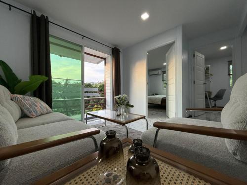 Stylish 2BR Bungalow with AC and 3 Minute Beach Walk