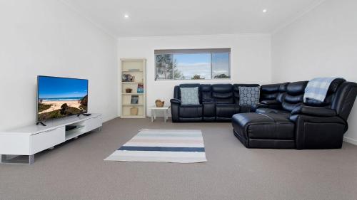 Glossies coastal Retreat in Valla Beach