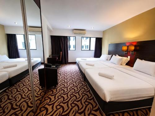 Cozy Studio at SCSP Suites Room Type - Comfort Triple Room with Shower
