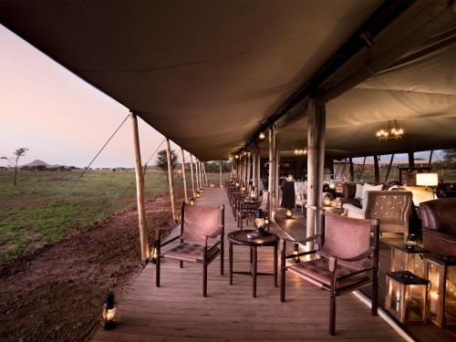 Koplietošanas atpūtas telpa ar TV, One Nature Nyaruswiga Serengeti in Banagi