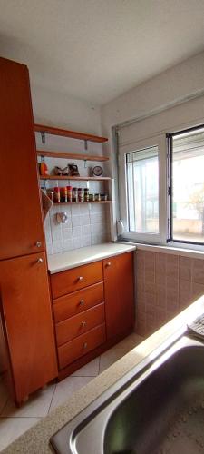 Kitchen, charmant logement in Lidia
