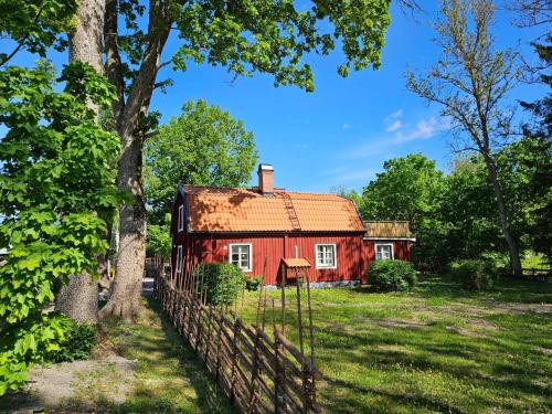 Tolvmansgården (Tolvmansgarden) in Enköping