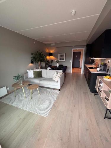 Bright, stylish apartment with a sunny balcony close to nature in Sogn
