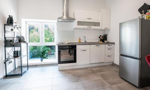 Cozinha, Apartment mit Arbeitsplatz, Parkplatz & Terrasse - für 4 (Apartment mit Arbeitsplatz, Parkplatz & Terrasse - fur 4) in Leonberg