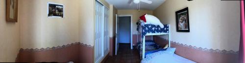 1 twin bed, 1 bunk bed, 1 futon bed