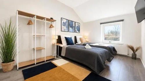 TT Living Apartments Rellingen I 1 & 2 Schlafzimmer I Küche I Waschmaschine I Parkplatz in Rellingen, Deutschland
