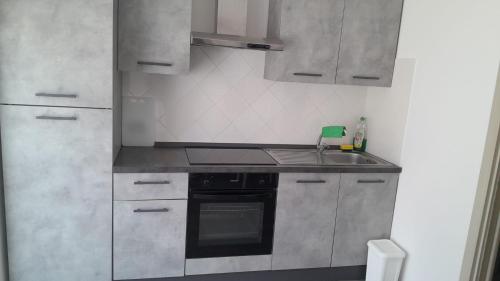 Kitchen, Rainbow Sweet Rooms in Valmontone