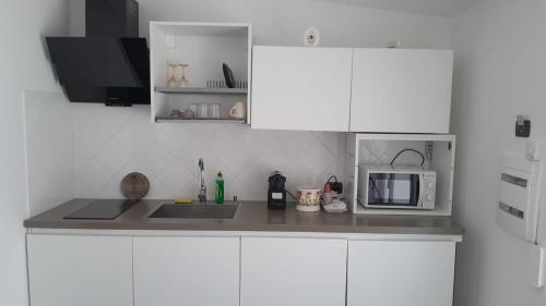 Kitchen, Rainbow Sweet Rooms in Valmontone