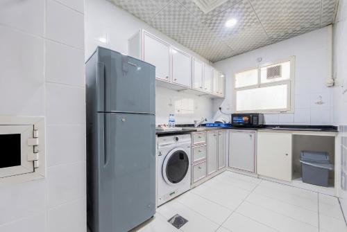 Down Town Plaza Hotel Apartments - Kitchen