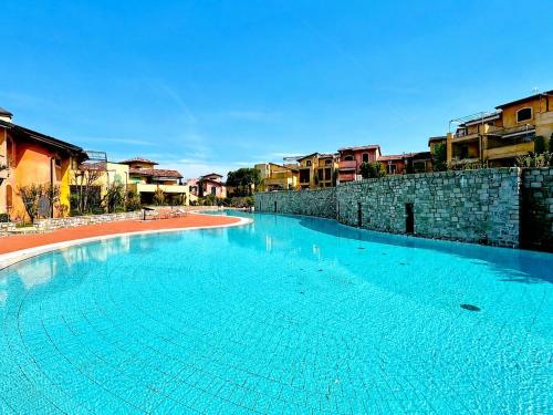 Apartment with 6 pools, tennis, games, and bar