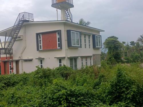 Coorg Family Villa in ปอลลิเบตตา