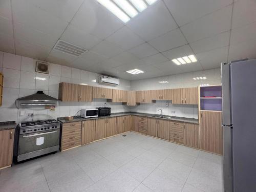 Kitchen, Al Saad Farm Private Resort 5 Bedrooms with Two Indoor Pools and Kids area By Betu in Al Sad