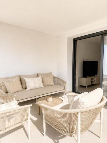 New modern in La Cala with terrace and pool