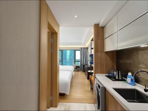 Guangzhou Huanzhi Meiju Hotel (Financial City Keyun Road Metro Station) - image 4