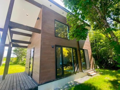 バルコニー/テラス, Rusutsu Holiday Cabin 8 min drive to ski lifts NEW in 真狩