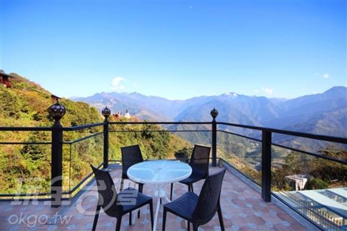 a patio with a view of a mountain range, Moose & Squirrel in Nantou