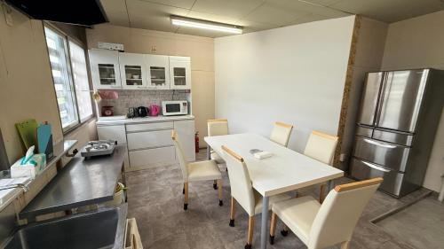 Kitchen, Hokkori Station Yubari -Private Rooms near Shin-Yubari Station in Yubari