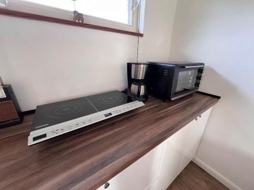 Ferienhaus Ferienwohnung mit Seezugang 1x über die Straße (Ferienhaus Ferienwohnung mit Seezugang 1x uber die Straße) in Gross Wittensee