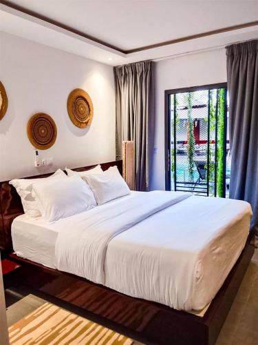 Family House Assinie - Hôtel & Villas (Family House Assinie - Hotel & Villas) in อัสซินี-มาเฟีย