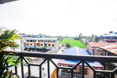 Erkély/terasz, Peacock - a family-run hotel in Chitwan