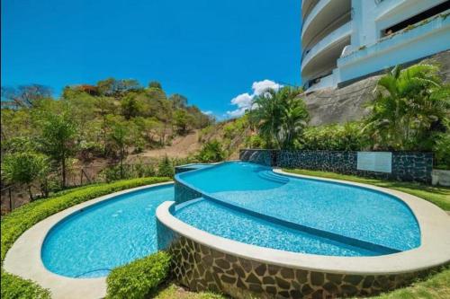 Stylish Oceanview Condo with Quick Beach Access Modern Design & Spacious Balcony in Playa Flamingo
