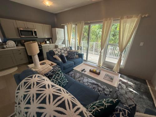 One Bedroom Luxurious Beach Front Villa Pool-Gym-AC Sleeps 5! in Falmouth