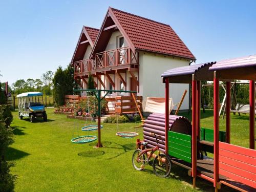 Two-story holiday homes with terraces playground - image 4