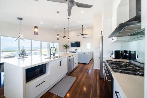 Executive Coastal Living with Ocean Views in Bushland Beach