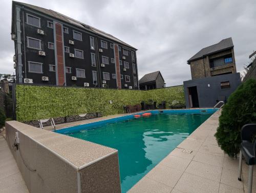 Swimming pool, JEVENOM HOTEL in Olowora