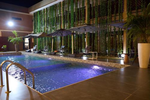 Family House Assinie - Hôtel & Villas (Family House Assinie - Hotel & Villas) in อัสซินี-มาเฟีย