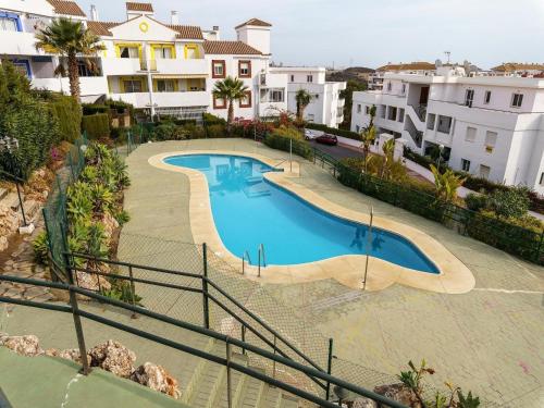 Apartment with garden and communal pool