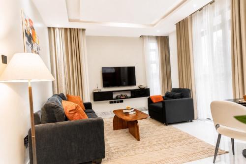 Modern 1BR Near Acacia Mall 24hours Power Free Parking - image 2