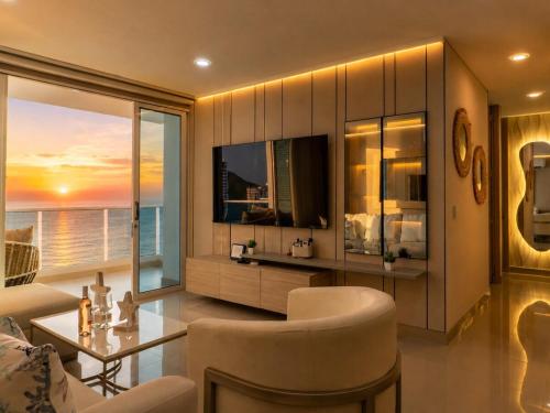 Apto con vista al mar, piscinas, Jacuzzis y Club de Playa en Reserva del Mar