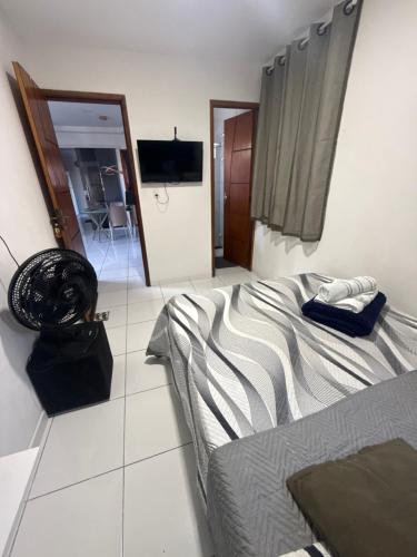 Cantinho Aconchegante - Quarto com Ar-cond 7