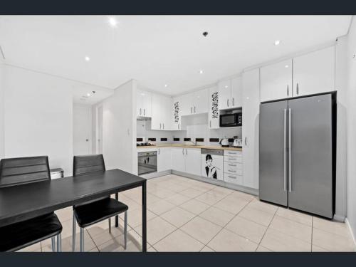 Kitchen, Luxury unit near to Sydney CBD and Airport 2b2b1p in Waterloo