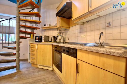 Haus Solaris - Ferienwohnung D'runner un D'rover - image 4