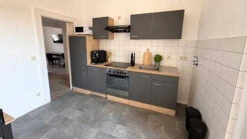 المرافق, Zentrumsnahe Wohnung mit bequemen Boxspringbetten, augestattete Küche, Balkon, Self Check-in, Wifi (Zentrumsnahe Wohnung mit bequemen Boxspringbetten, augestattete Kuche, Balkon, Self Check-in, Wifi) in Halberstadt