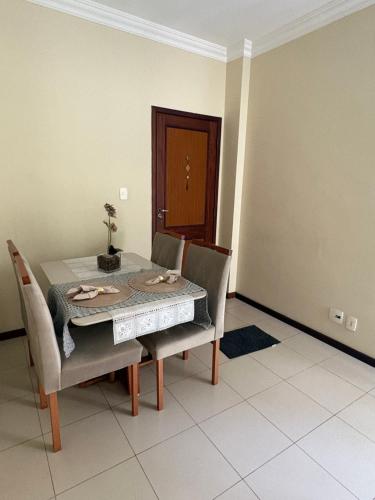 Quarto em apartamento in Centro da cidade